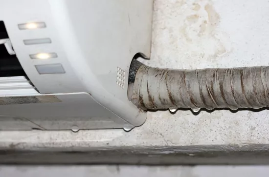 Water dripping from an outdoor air-conditioning unit
